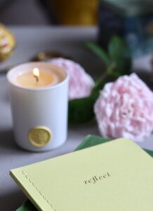 Candle and journal